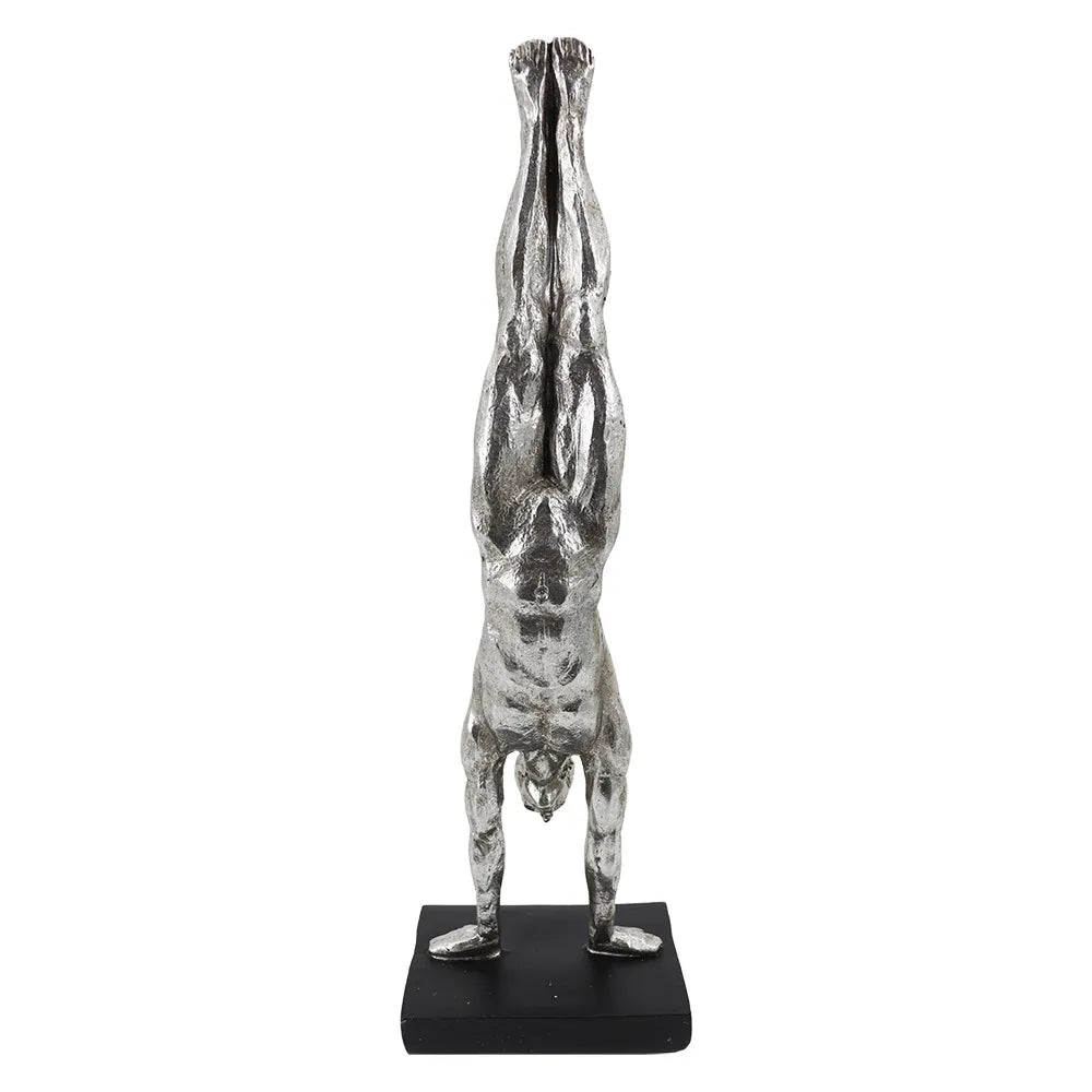 ESTATUETA HOMEM FAZENDO MALABARISMO - AQUI VC DECORA